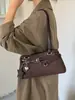 Elegante y simple moda 2026 nuevo bolso de hombro de gran capacidad versátil de nicho para mujer para el otoño y para ir al trabajo