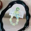 Cadena de teléfono colorida de acrílico hecha a mano con cuentas, charm de oso helado, exquisito accesorio para bolso, un pequeño regalo para parejas