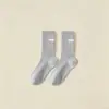 Calcetines de media pantorrilla para hombre para otoño e invierno, resistentes al olor y absorbentes del sudor, color liso, con letra, deportivos, modernos, calcetines de baloncesto