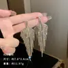 Exquisitos pendientes largos cortos con borlas incrustados de perlas y diamantes para mujer diseño de nicho de lujo ligero pendientes de lazo amor