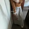 Temperamento elegante y suave~ Falda de color liso engrosada para mujer, estilo coreano, adelgazante, falda larga de caída de alta gama, falda midi de línea A