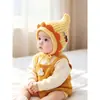Bonito gorro de lana tejido para bebés en otoño e invierno, unisex, con protección para las orejas y características a prueba de viento, adecuado para niños pequeños como gorro de invierno