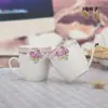 Taza de Cerámica Taza de Café con Asa Taza de Té Kung Fu Porcelana de Hueso Resistente al Calor Taza para Beber Casera Taza de Té con Flores Taza de Leche Taza Creativa