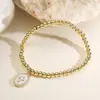 Aogu Nova Moda Versátil Transfronteiriça Cobre Banhado a Ouro 18K Pingente Geométrico de Coração com Gotejamento de Óleo Pulseira com Contas para Mulheres
