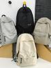 Mochilas escolares nuevas de gran capacidad transfronterizas para hombres y mujeres 2024 nueva mochila para estudiantes de comercio exterior mochila casual ligera
