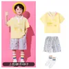 Traje de porrista para el Día del Niño para estudiantes de primaria, conjunto de uniforme de clase para el día del deporte escolar, disfraz de lunares con falda corta para jardín de infantes