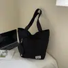 Bolso de hombro casual simple estilo japonés inspirado en Ins para mujer, nuevo modelo 2026, bolso tote de gran capacidad, color liso para estudiantes