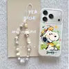 Adecuado para iPhone 17 caricatura 15 Pro Max funda de teléfono con pulsera Apple 16 Pro Europeo y Americano 14 pintura al óleo Snoopy