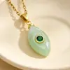 Bestseller transfronterizo de Amazon: Colgante de imitación de piedra natural con ojo de circonita y diseño de gota de agua, con delicados adornos de circonita, un collar moderno y único