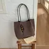 Bolsa tote casual de grande capacidade, cor sólida, nova versão coreana outono 2026, bolsa de mão e bolsa de ombro personalizadas para trabalho e deslocamento