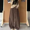 Calça moletom casual simples de outono, solta e modeladora, calça de perna larga versátil com um design de amarração moderno e um corte curvo retrô