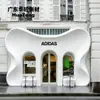 Fachada de porta e janela em arco de UHPC, colunas curvas modernas, painéis decorativos de parede de concreto Shimizu resistentes às intempéries para exterior de hotel.