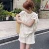 Verano con un conjunto de encaje hueco de encaje de alta gama de sal, luz, maduro, top y shorts, traje de dos piezas de moda