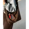Bolsa de Hombro Cruzada de Moda Otoño e Invierno Transfronteriza para Mujer 2025 Nueva Bolsa Cubo Estampado de Leopardo Bolso Cruzado de Hombro Plegado