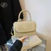 Bolso Pequeño Cuadrado Retro Estilo Hong Kong Hombro Único 2026 Nuevo de Moda Diseño de Nicho Moda Color Sólido Bolso de Hombro Cruzado de Alta Gama