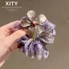 Elásticos de cabelo florais com estampa de leopardo, estilo retrô e modernos, perfeitos para criar um rabo de cavalo alto ou um coque na parte de trás da cabeça - um novo acessório de cabelo