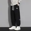 Pantalones de chándal pesados para hombre, primavera y otoño 2025, nuevos y modernos, holgados, casuales, con retazos, engrosados, deportivos, tipo jogger