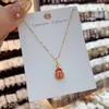 Traje combinado de pendientes y collar de calabaza Fulu de lujo ligero para la red pública 2024 nueva cadena para la clavícula de gama alta de la red