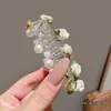 Elástico de Cabelo Fio de Telefone Pérola Rosa Grampo de Cabelo Flor Corda de Cabelo Acessório de Penteado Feminino Novo Modelo 2025 em Estoque