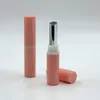 Venta al por mayor del fabricante Tubo de lápiz labial redondo rosa con núcleo electrochapado, aplicador inclinado, tubo redondo, material de embalaje de plástico