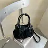 Exquisito y moderno bolso plisado de nicho para mujer, nuevo modelo 2026 bolso cruzado, bolso de cubo de gamuza retro a la moda