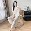 Estilo Miyake Verão 2026 Novo Conjunto de Tricô Plissado para Mulheres Decote V Manga Curta Emagrecedor e Que Valoriza a Silhueta Conjunto de Duas Peças para o Trabalho