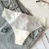 2026 Nuevo Estilo Color Sólido Ligero Seda de Hielo Sin Costuras Transpirable Yoga Sin Costuras Pantalones Cortos de Mujer