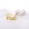 Anillo abierto con incrustaciones de diamantes huecos y diseño de estilo nicho, anillo de dedo índice personalizado de moda femenina, pulsera de celebridad de Internet que combina con todo.