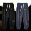 Pantalones casuales engrosados para hombre, nuevos pantalones deportivos tipo jogger de pana cálida para hombre con retazos, modernos y versátiles