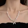 Corrente para Clavícula Feminina Nova Moda Verão Pérola Borla Cauda de Peixe Leve Luxo High-End Colar Simples Moderno Versátil