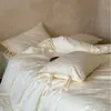 Juego de cuatro piezas de algodón de fibra larga estilo francés, juvenil, con un toque de alta gama, funda de edredón de algodón puro jacquard, sábana con cintas y funda de almohada