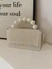 Bolsa de Mão Tecida à Mão Pura Transfronteiriça de Socialite Francesa Moda Feminina Versátil com Aba Pérolas para Ombro Transversal Tendência