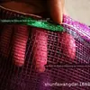Atacado de fábrica novo material pp saco de malha especial para cebola saco de malha dente de pele Jianli saco trançado para cebola lã exportação