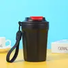 Nueva taza de Coca-Cola de comercio exterior para coche, taza de café portátil con cuerda, taza de vacío de acero inoxidable 304 de aspecto atractivo para hombres y mujeres