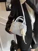 Bolso tipo almohada de moda casual para mujer, bolso cruzado simple y versátil, nuevo bolso de hombro de color liso para la primavera 2026