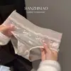 Tanga de Encaje Francés Pure Desire de Malla Suave para Mujer Cintura Media-Baja Ropa Interior Sin Costuras Sexy Temperamento Algodón Blanco en la Entrepierna