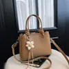 2026 Nova Bolsa de Mão de Luxo Estilo Coreano Feminina Grande Capacidade Bolsa Tote para o Dia a Dia Versátil Bolsa de Ombro Único Transversal