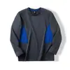 La máquina de empalme de agujeros de tres colores puede enrollar camiseta de manga larga 6948