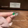 Venta al por mayor del fabricante Xiaohongshu Jade Verde Natural Calabaza Anillo de Bambú con Incrustación de Plata S925, Diseño Simple