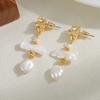 Pendientes colgantes de perlas barrocas transfronterizas de Europa y Estados Unidos, pendientes de moda nicho con temperamento chapado en oro y cobre para mujer