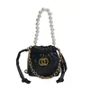 Bolso Pequeño Estilo Chanel para Mujer con Bordado Acolchado, Bolso de Cubo con Cordón, Bolso Cruzado de Cadena, Bolso Mini Popular de Lujo Ligero para Labiales