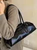 Bolso de hombro minimalista de nicho estilo coreano Shuai Mi Jia para mujer, nuevo modelo de moda otoño 2026, bolso baguette para debajo del brazo