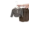 Traje de Otoño para Niña Camiseta a Rayas de Manga Larga Color Café Pantalones Bombachos Estilo Coreano Conjunto de Dos Piezas Transfronterizo