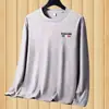 Camiseta Masculina de Manga Longa para Primavera e Outono Gola Redonda Casual Tendência Ins Estampada Camiseta Interna Camiseta Masculina Roupa de Outono Camiseta Básica