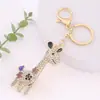 Llavero de Ciervo Creativo de Lujo Ligero Colgante Pequeño Accesorio Brillantina Mochila Jirafa Llavero de Metal