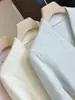 Suéter Cárdigan de Punto Suave y Esponjoso con Cuello en V de Temperamento para Mujer 2026 Nuevo Otoño Estilo Coreano Delgado Top Base