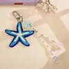 Estilo vacacional de verano en la playa, amuleto de teléfono de cuentas de colores, colgante de bolsa con decoración de estrella de mar en degradado fresco, pequeño regalo