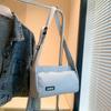 Bolsas para Hombres y Mujeres Bolsas de Pareja 2025 Nueva Bolsa de Tela de Nylon Bolsa de Hombro Cruzada para Estudiantes Mochila Casual Ligera Estilo K
