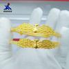 Pulsera de latón chapada en oro directo de fábrica Pavo real pantalla abierta push-pull pulsera de mujer electrochapada oro de imitación joyería de boda
