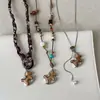 Collar Colgante de Caballo Mecedora Tallado en Madera Inspirado en el Diseño para Mujer, Vintage Lujo Ligero de Moda Versátil Gargantilla Cadena de Suéter